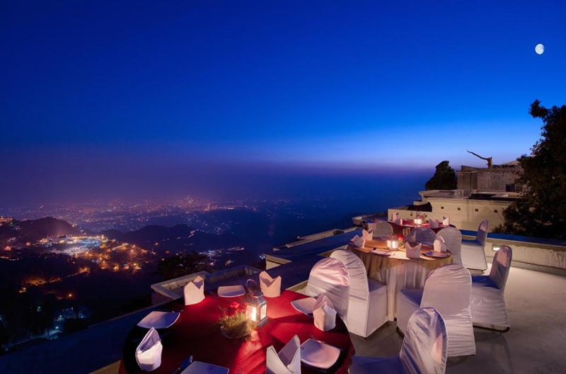 Moonlit poolside gourmet dining