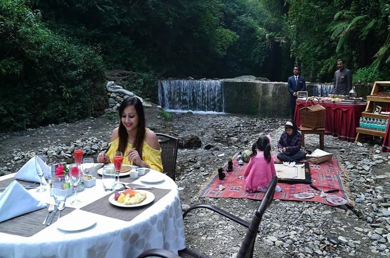 Romantic picnic by a waterfall experience