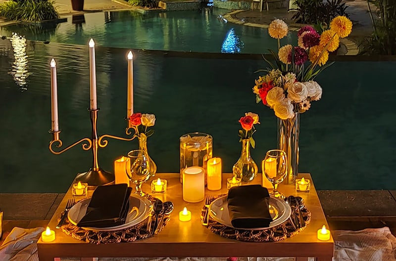 Private poolside candlelit dining experience