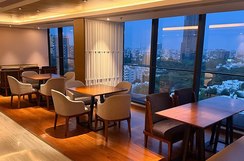Skyline breakfast beside glass windows