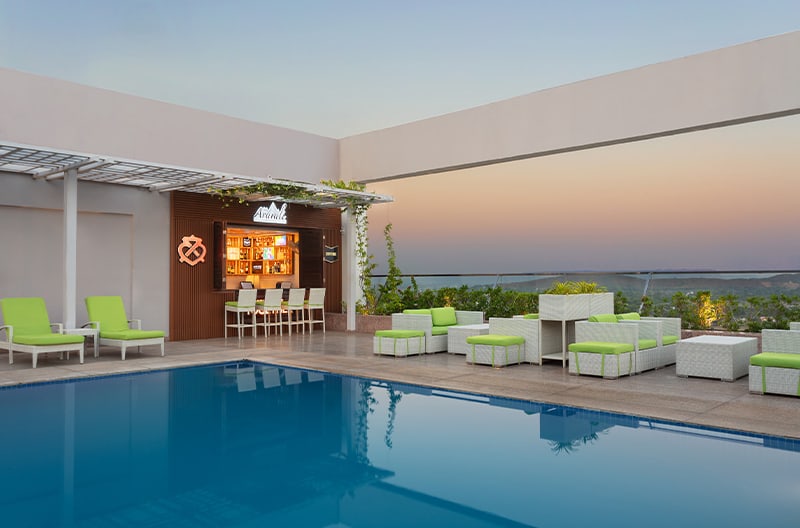 Rooftop candlelit dining beneath starlit skies